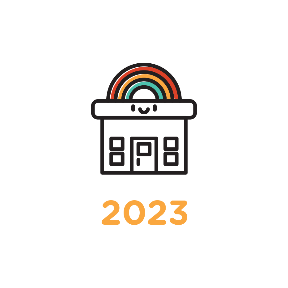Icon of a building with a rainbow and text reading “2023.”